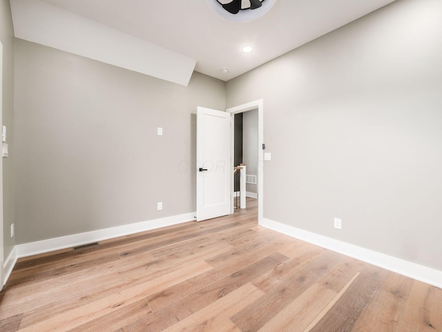 496 W 1st Ave, Columbus, OH 43201 - empty room with baseboards, light wood finished floors, and recessed lighting