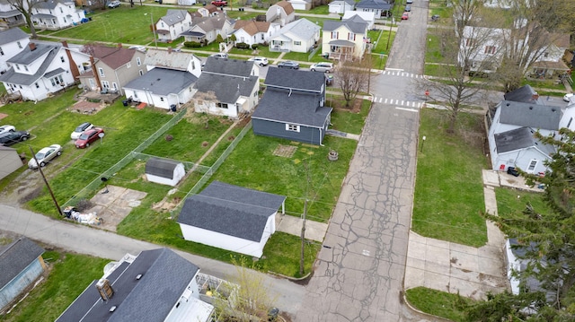 birds eye view of property with a residential view