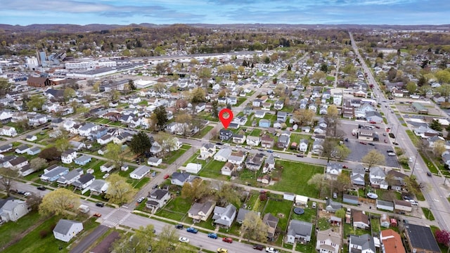 birds eye view of property with a residential view and a mountain view
