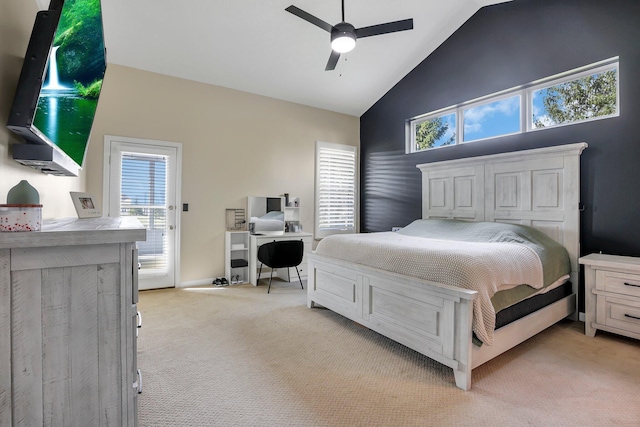 bedroom featuring high vaulted ceiling, ceiling fan, light carpet, and multiple windows