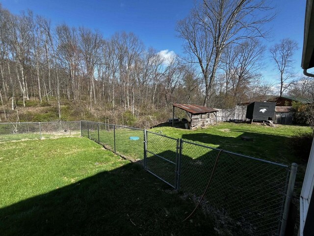 view of yard with a gate and fence