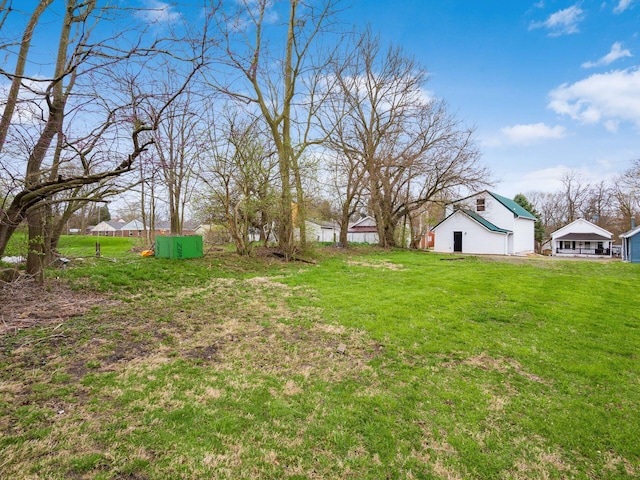 view of yard featuring a garage