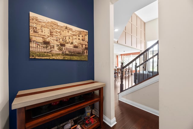 816 Kelburn Ln, Pickerington, OH 43147 - hall featuring baseboards, wood finished floors, and stairs