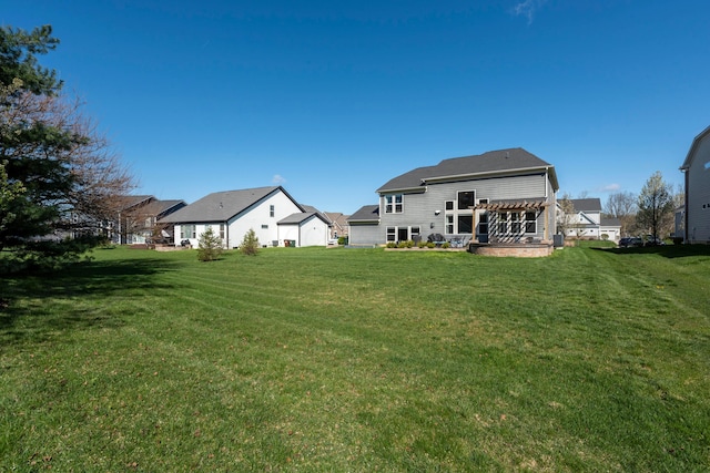 816 Kelburn Ln, Pickerington, OH 43147 - back of property with a lawn and a pergola