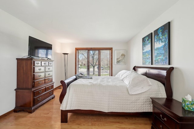 bedroom with light wood-type flooring