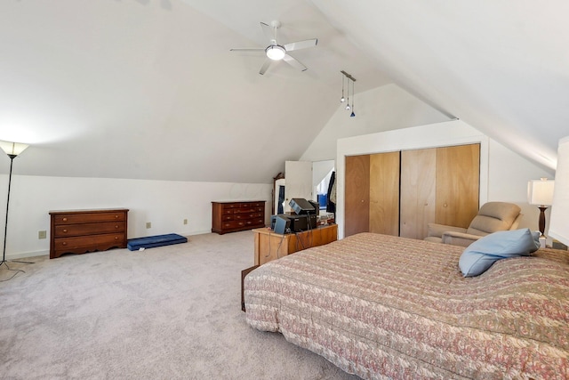 bedroom featuring lofted ceiling, a ceiling fan, carpet flooring, and baseboards
