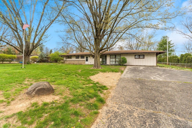 3434 Fishinger Rd, Columbus, OH 43221 - ranch-style home featuring fence, driveway, and a front yard