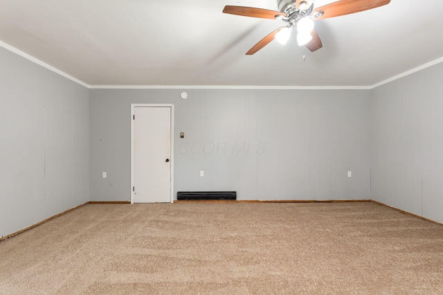 3434 Fishinger Rd, Columbus, OH 43221 - carpeted spare room featuring baseboard heating, baseboards, ceiling fan, and crown molding