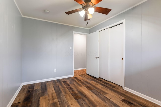 3434 Fishinger Rd, Columbus, OH 43221 - unfurnished bedroom featuring wood finished floors, a ceiling fan, a closet, crown molding, and baseboards