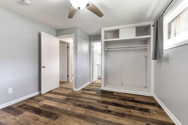 3434 Fishinger Rd, Columbus, OH 43221 - unfurnished bedroom featuring a ceiling fan, baseboards, dark wood-style flooring, and a closet