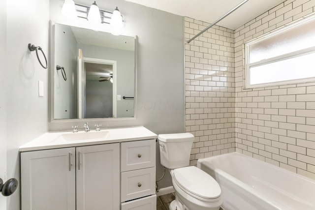 3434 Fishinger Rd, Columbus, OH 43221 - bathroom featuring bathtub / shower combination, vanity, ceiling fan, and toilet