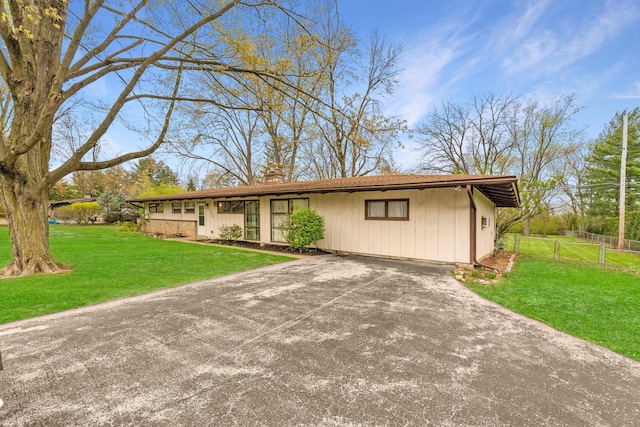 3434 Fishinger Rd, Columbus, OH 43221 - ranch-style home featuring fence, driveway, a chimney, and a front yard