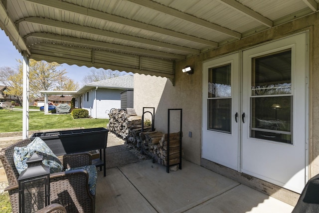 view of patio / terrace featuring french doors