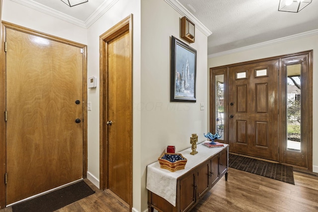 entryway with baseboards, dark wood-type flooring, and ornamental molding