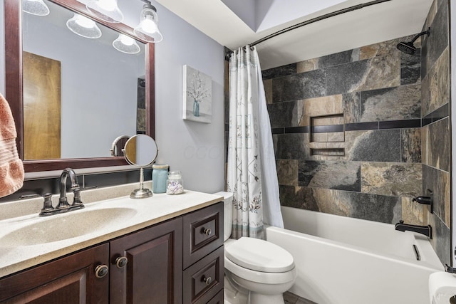 full bathroom with toilet, vanity, and shower / tub combo with curtain