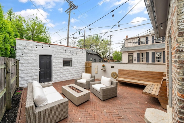 129 Jackson St, Columbus, OH 43206 - view of patio / terrace with a fire pit and fence