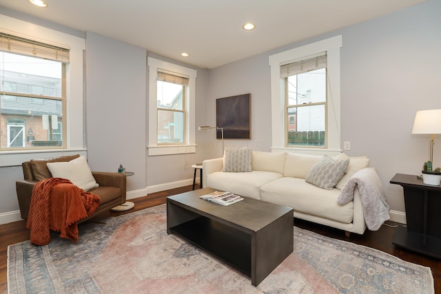 129 Jackson St, Columbus, OH 43206 - living room featuring wood finished floors, baseboards, and recessed lighting