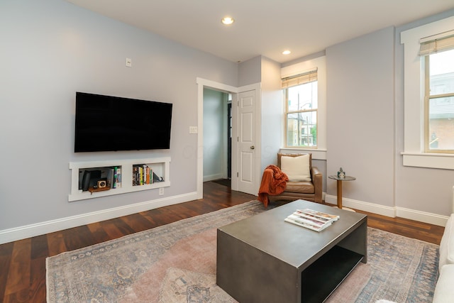 129 Jackson St, Columbus, OH 43206 - living room featuring wood finished floors, baseboards, and recessed lighting