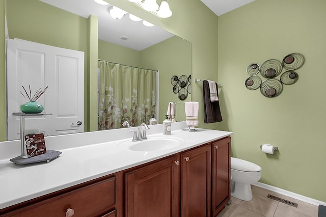 full bath featuring tile patterned floors, visible vents, toilet, vanity, and baseboards