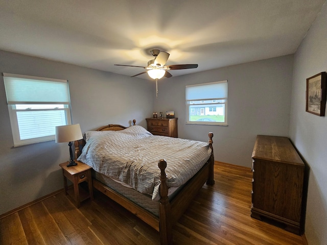 3890 Tamara Dr, Grove City, OH 43123 - bedroom with wood finished floors and a ceiling fan