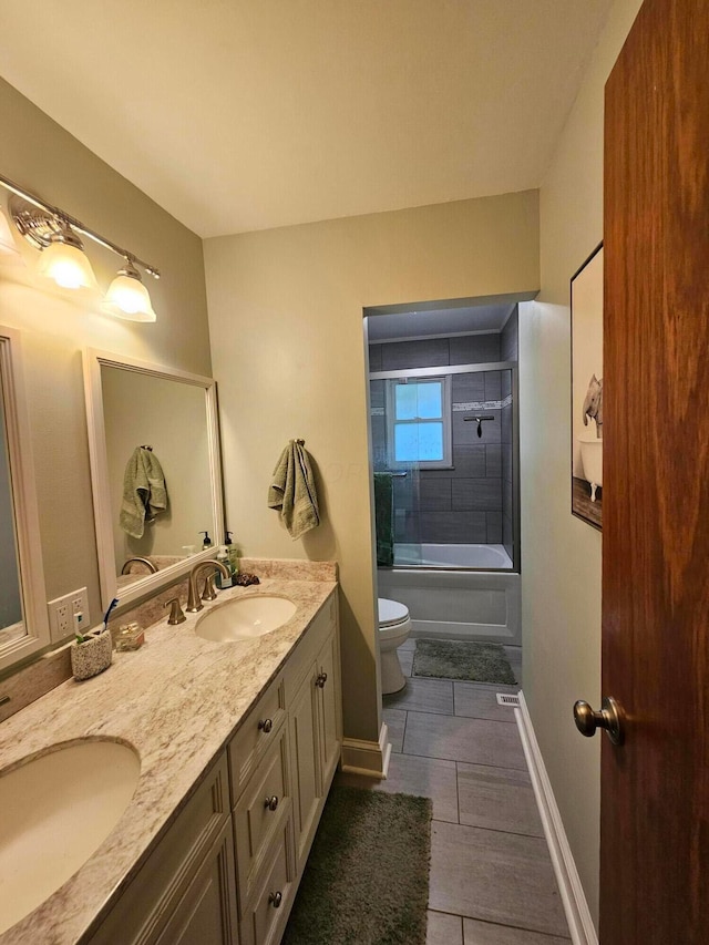 3890 Tamara Dr, Grove City, OH 43123 - bathroom featuring double vanity, bathtub / shower combination, and tile patterned floors