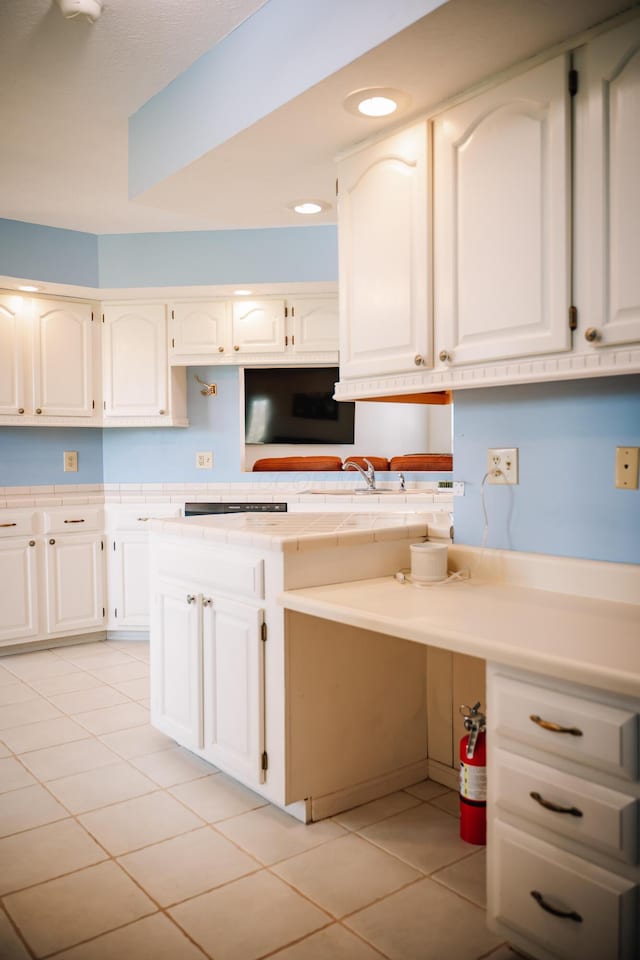 17920 Miller Rd, Richwood, OH 43344 - kitchen with white cabinets, recessed lighting, and light tile patterned floors