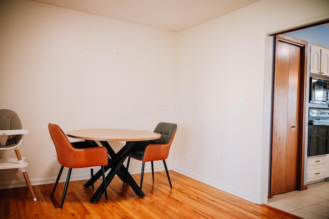 17920 Miller Rd, Richwood, OH 43344 - dining space featuring light wood-type flooring and baseboards