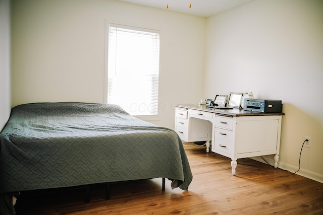 17920 Miller Rd, Richwood, OH 43344 - bedroom featuring baseboards and light wood-type flooring