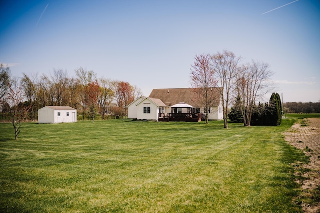 17920 Miller Rd, Richwood, OH 43344 - view of yard featuring a wooden deck, a shed, and an outdoor structure