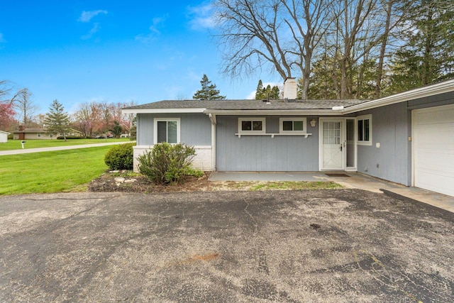 3318 Darbyshire Dr, Hilliard, OH 43026 - view of front of property with a front yard and a chimney