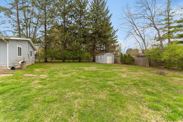 3318 Darbyshire Dr, Hilliard, OH 43026 - view of yard featuring a fenced backyard, an outdoor structure, and a shed