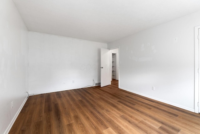 3318 Darbyshire Dr, Hilliard, OH 43026 - empty room featuring baseboards and wood finished floors