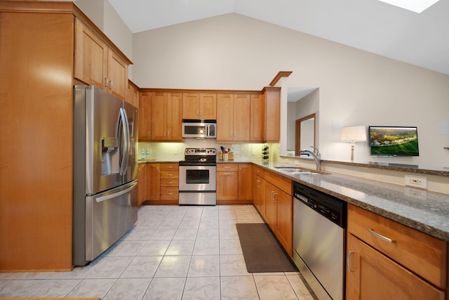 2882 Kool Air Way, Columbus, OH 43231 - kitchen with tasteful backsplash, a sink, light tile patterned floors, stone countertops, and stainless steel appliances