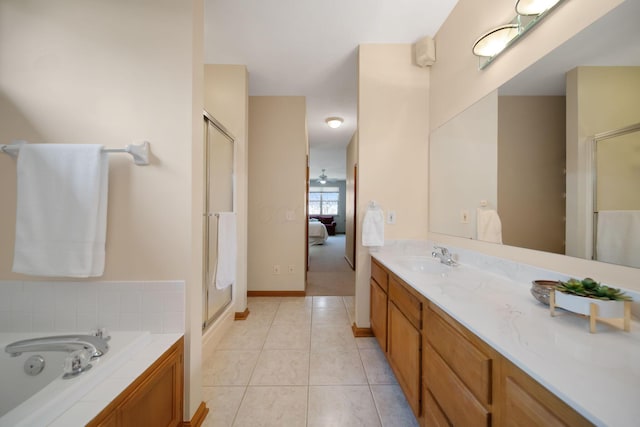 2882 Kool Air Way, Columbus, OH 43231 - bathroom featuring a stall shower, ensuite bathroom, tile patterned flooring, a garden tub, and vanity