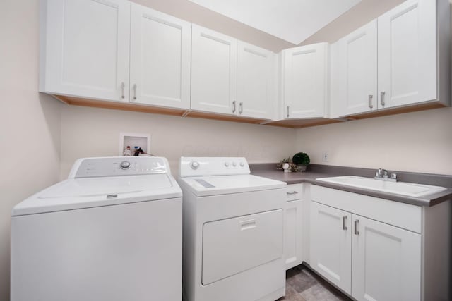 2882 Kool Air Way, Columbus, OH 43231 - laundry room featuring washer and dryer, cabinet space, and a sink