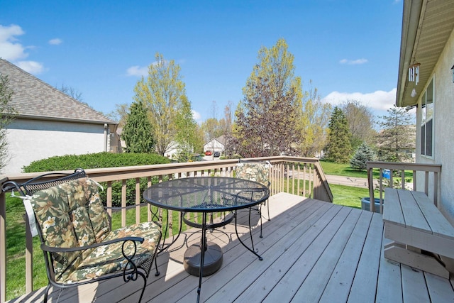 2882 Kool Air Way, Columbus, OH 43231 - wooden terrace featuring outdoor dining area and a yard