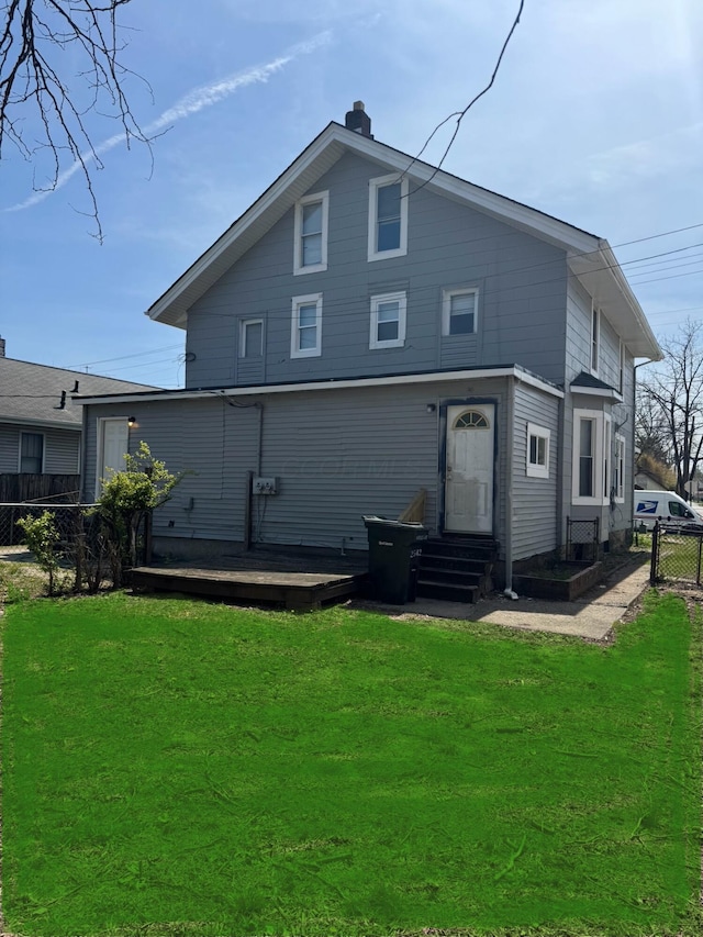 2540-2542 Steele Ave, Columbus, OH 43204 - back of house with entry steps, a deck, and a chimney