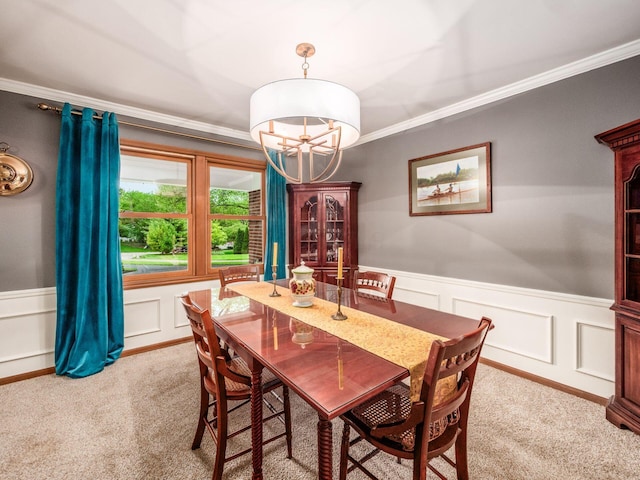 4159 Rowanne Rd, Columbus, OH 43214 - carpeted dining room with a chandelier, crown molding, a decorative wall, and wainscoting