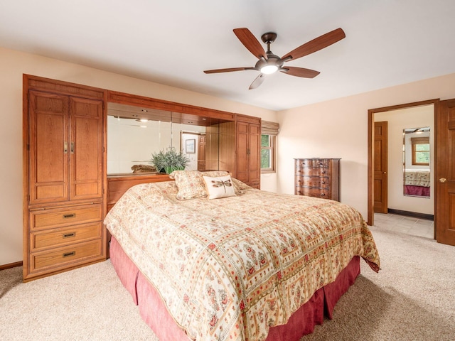 4159 Rowanne Rd, Columbus, OH 43214 - bedroom with light carpet, baseboards, and ceiling fan