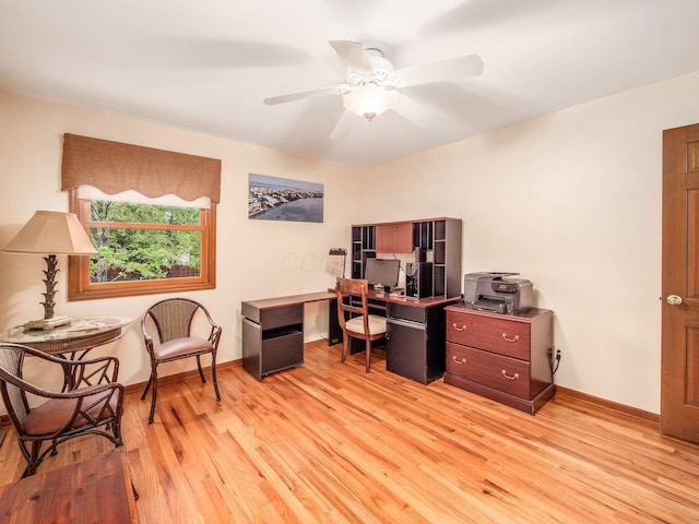 4159 Rowanne Rd, Columbus, OH 43214 - office area featuring light wood-type flooring, ceiling fan, and baseboards