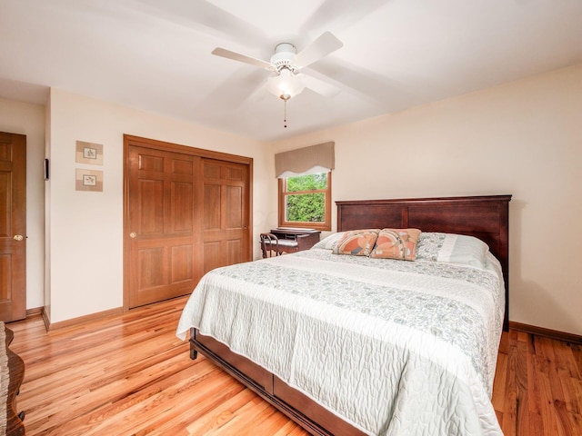 4159 Rowanne Rd, Columbus, OH 43214 - bedroom featuring baseboards, a closet, light wood-style flooring, and a ceiling fan