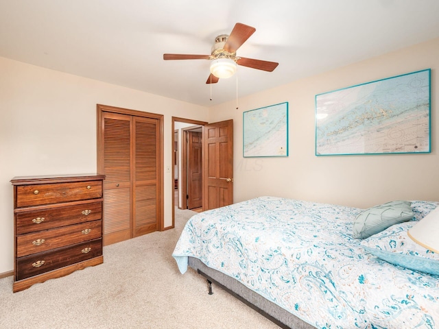 4159 Rowanne Rd, Columbus, OH 43214 - bedroom featuring carpet floors, a closet, and a ceiling fan