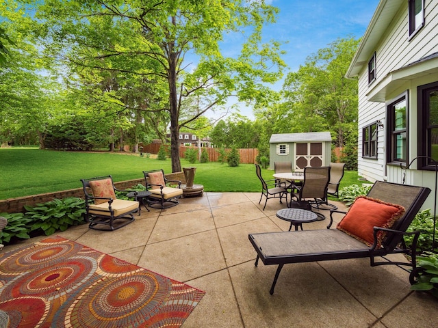 4159 Rowanne Rd, Columbus, OH 43214 - view of patio / terrace with a shed, an outdoor structure, and outdoor dining area