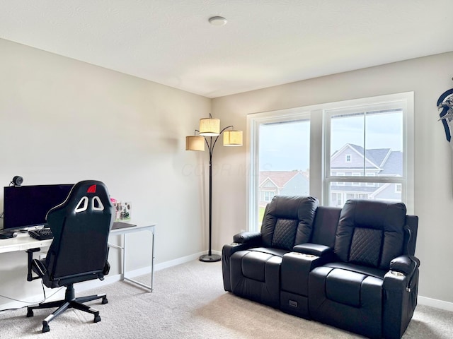 office area featuring carpet and baseboards