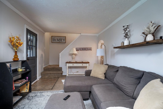 living area with stairs, crown molding, and a textured ceiling