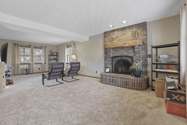 carpeted living area with recessed lighting, a fireplace, and baseboards
