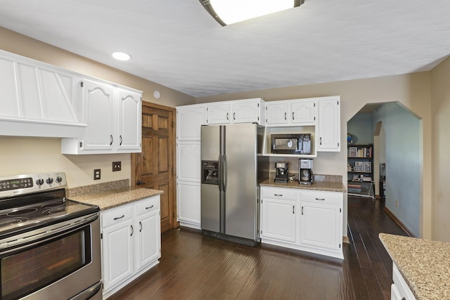 kitchen featuring white cabinets and stainless steel appliances