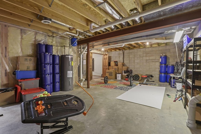 unfinished below grade area with water heater and concrete block wall