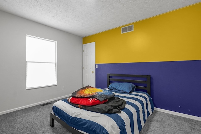 1065 Mastell Dr, Reynoldsburg, OH 43068 - bedroom with carpet floors, baseboards, and a textured ceiling