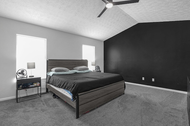 1065 Mastell Dr, Reynoldsburg, OH 43068 - carpeted bedroom featuring a textured ceiling, ceiling fan, vaulted ceiling, and baseboards